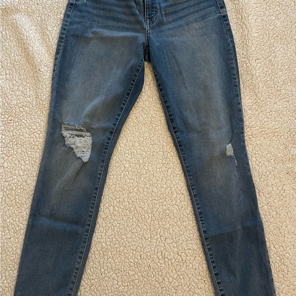 Women's Distressed Blue Jeans